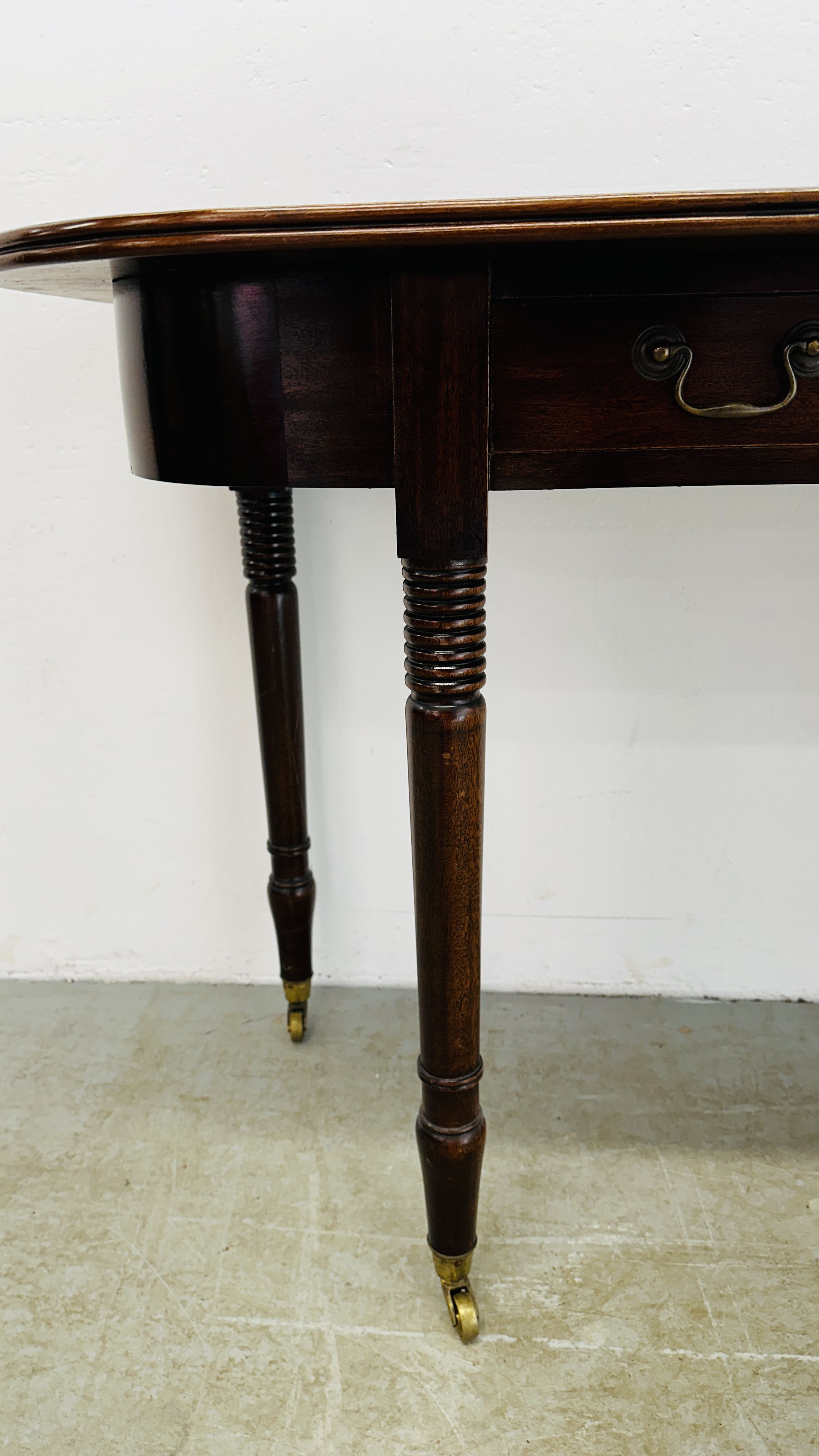 A MAHOGANY D END TABLE SUPPORTED ON BRASS CASTERS 126CM W X 49CM D X 79CM H. - Image 12 of 14