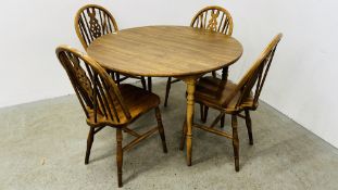 MODERN OAK EFFECT KITCHEN BREAKFAST TABLE AND A SET OF 4 WHEEL BACK DINING CHAIRS DIAMETER 106CM.