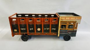 A HAND MADE WOODEN MODEL OF INDIAN TRANSPORT LORRY - LENGTH 95CM (WHEEL A/F)