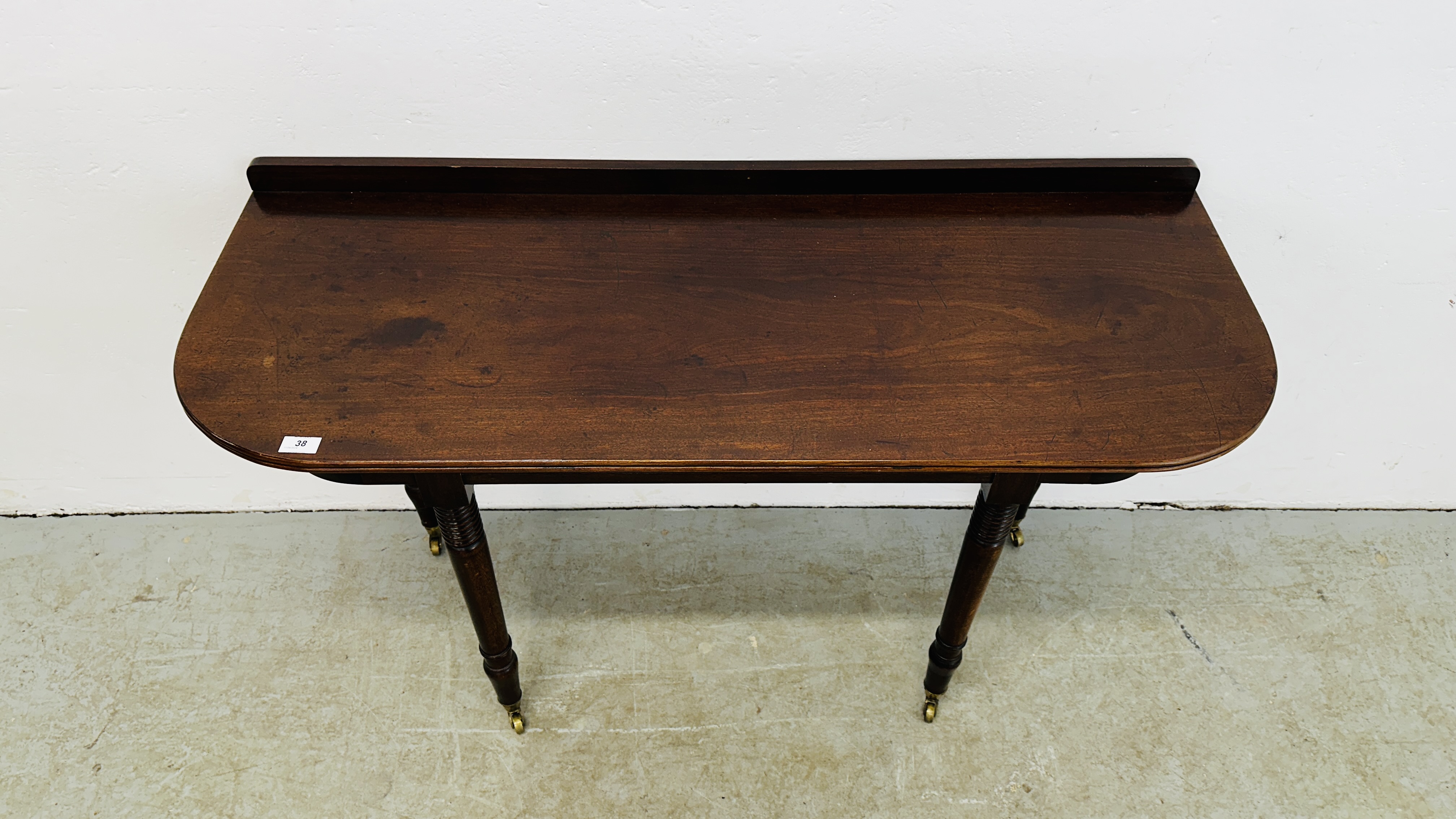 A MAHOGANY D END TABLE SUPPORTED ON BRASS CASTERS 126CM W X 49CM D X 79CM H. - Image 2 of 14