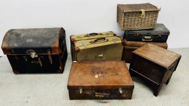 A GROUP OF VINTAGE SUITCASES AND A VINTAGE TRUNK, WICKER BASKET + AN OAK ARTS & CRAFTS SEWING BOX.