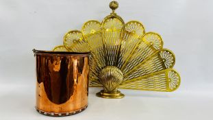 A REPRODUCTION BRASS PEACOCK & SHELL DESIGN FIRE GUARD W 95CM X H 65CM ALONG WITH A COPPER FIRE