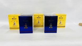 A GROUP OF 5 WADE BELLS WHISKY CHRISTMAS DECANTERS COMPRISING 2 X 2004 AND 3 X 2005 EXAMPLES.