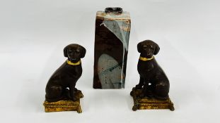 A PAIR OF RESIN DOGS SAT ON CUSHIONS 1 A/F 19CM H.