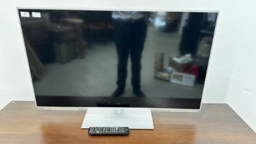 PANASONIC 42 INCH SMART TELEVISION WITH REMOTE - SOLD AS SEEN.