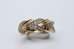 A GENT'S 9CT GOLD DIAMOND SET WEDDING RING.