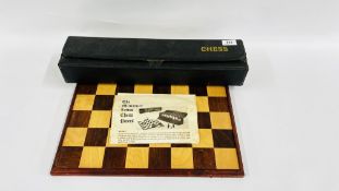 A CHESS SET IN CARRY CASE WITH CHESS BOARD.