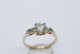 A ROUND BRILLIANT CUT NATURAL DIAMOND SOLITAIRE RING AND TWELVE SINGLE CUT NATURAL DIAMONDS EITHER