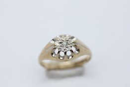 A 9CT GOLD DIAMOND SOLITAIRE IN AN OPEN SETTING.