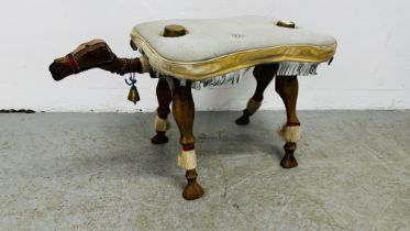 A CAMEL STOOL.