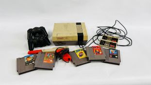 VINTAGE NINTENDO ENTERTAINMENT SYSTEM WITH GAMES AND REMOTE + OTHER REMOTES - SOLD AS SEEN.