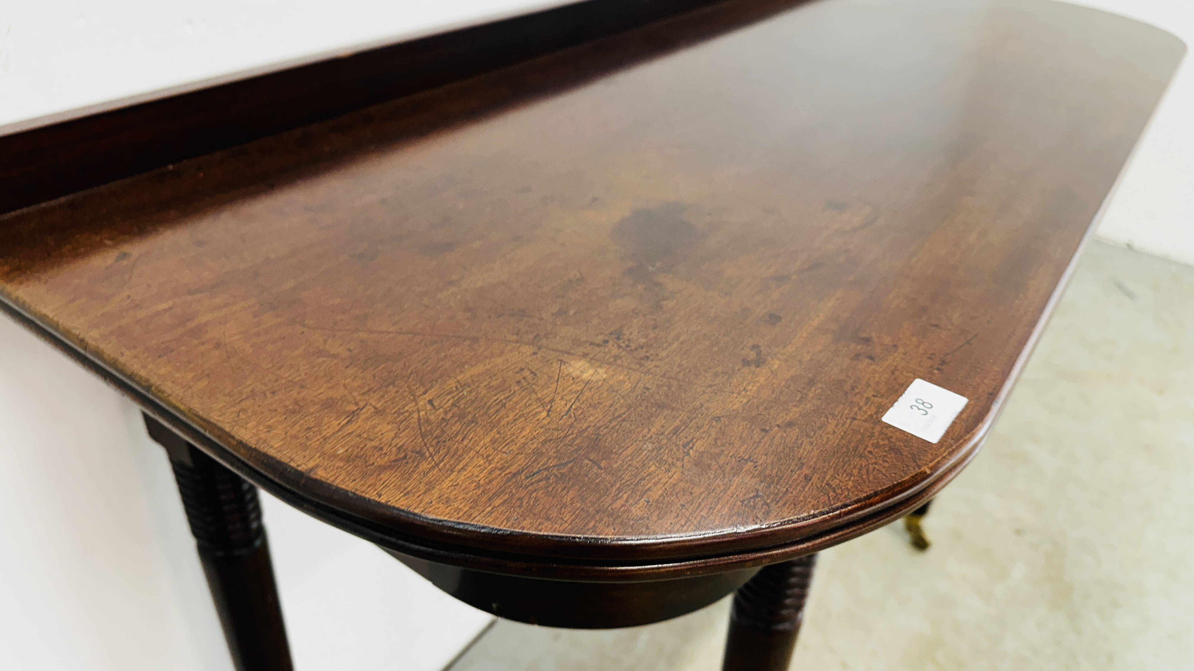 A MAHOGANY D END TABLE SUPPORTED ON BRASS CASTERS 126CM W X 49CM D X 79CM H. - Image 7 of 14