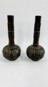 A PAIR OF JAPANESE BRONZE VASES OF ONION FORM, HAVING RAISED DECORATIVE PANELS,