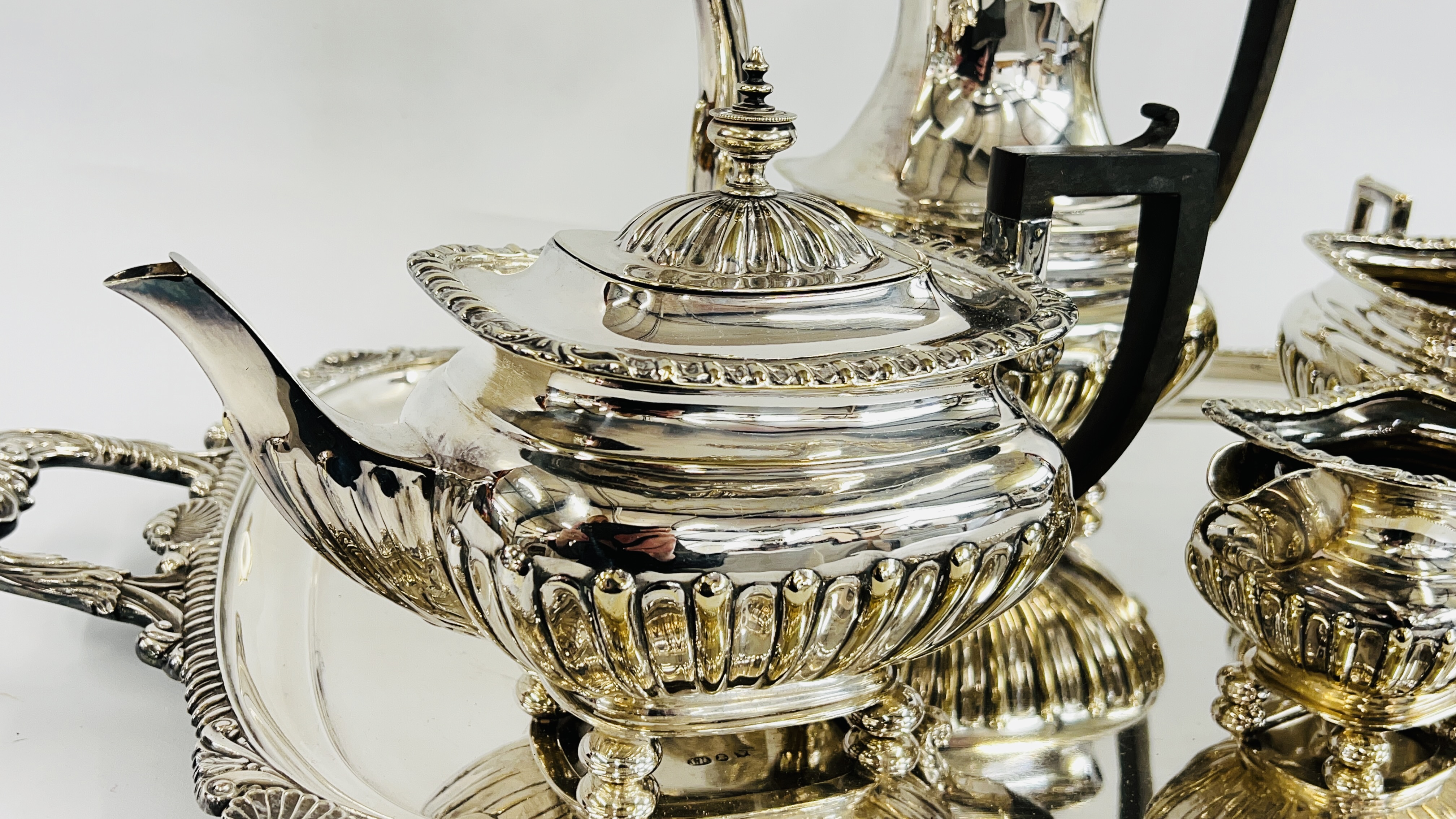 A VINTAGE 4 PIECE SILVER PLATED TEA SET AND AN IMPRESSIVE TWO HANDLED TRAY OF SHELL DESIGN MARKED H. - Image 2 of 9