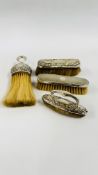 THREE SILVER BACKED DRESSING TABLE BRUSHES AND A SILVER BACKED NAIL BUFF.