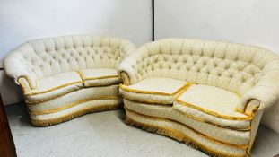 A PAIR OF SHABBY CHIC CARVED 2 SEATER FLORAL PATTERNED SOFAS.
