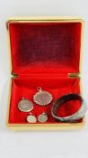 A VINTAGE SILVER HINGED BANGLE ALONG WITH TWO COIN SET PENDANTS TO INCLUDE A CROWN AND A TWO