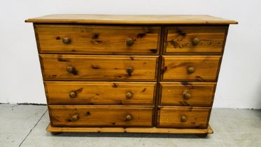 A HONEY PINE MULTI DRAWER CHEST, 4 LONG DRAWER BESIDE 3 SHORT DRAWERS, W 120CM, D 41CM, H 83CM.