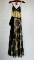 1940S CREAM SATIN GOWN WITH BLACK NET OVERDRESS, DECORATED WITH LACE SHELL DESIGN - A/F CONDITION,