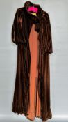 1920S BROWN VELVET LONG CAPE, BUTTONED ON COLLAR, PUFF SLEEVES - A/F CONDITION, SOLD AS SEEN.