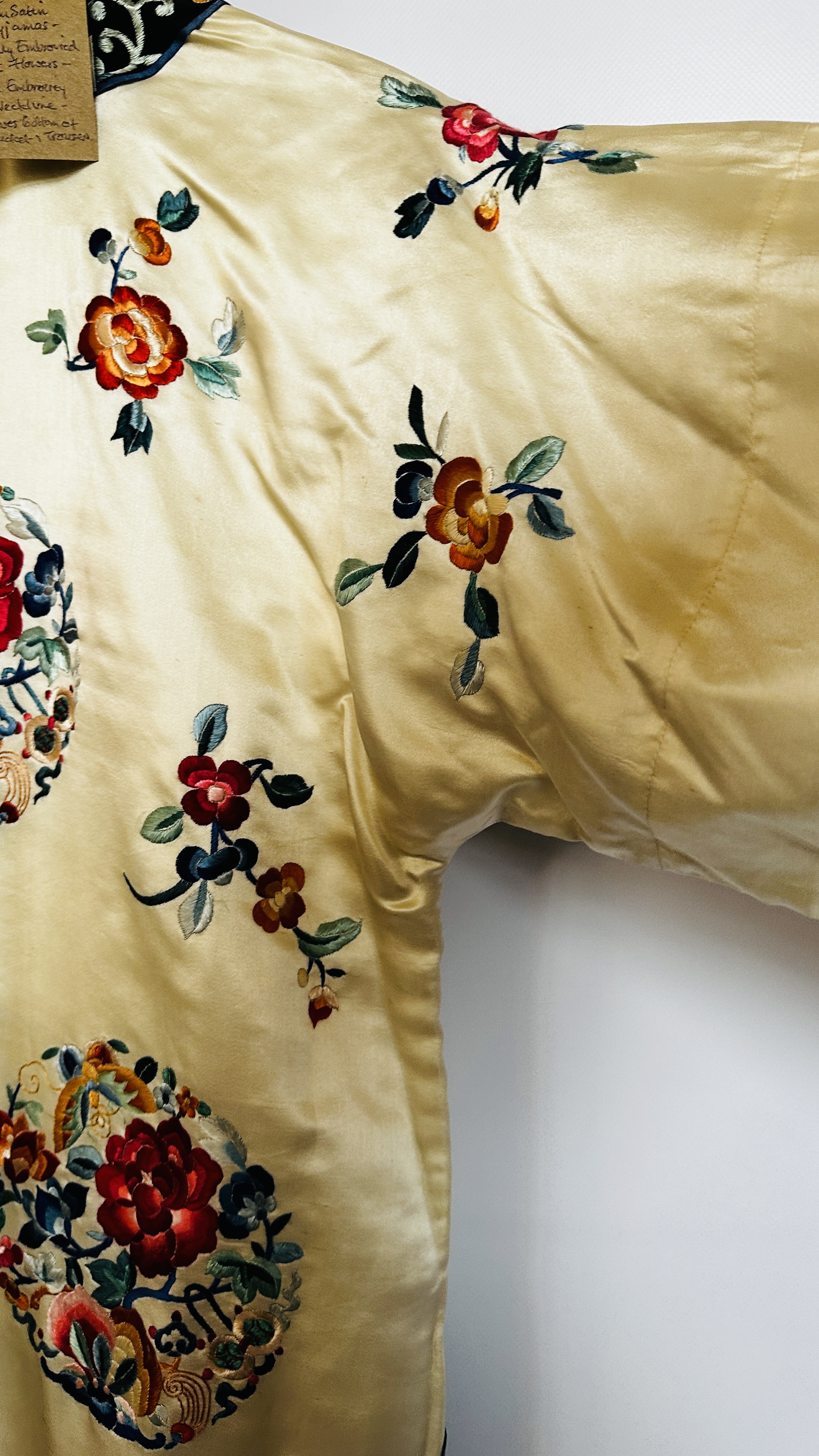 1920S CREAM SATIN CHINESE PYJAMAS, HEAVILY EMBROIDERED WITH FLOWERS, BLACK EMBROIDERED AT NECKLINE, - Image 31 of 36