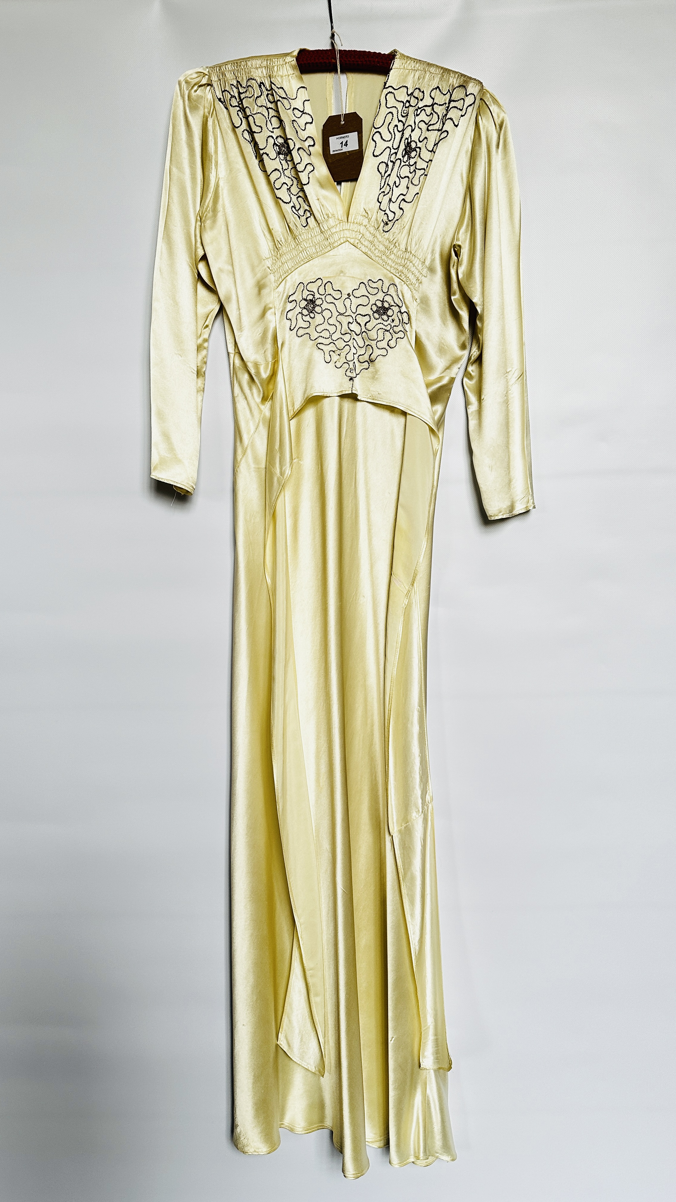 1940S CREAM SATIN GOWN, EMBROIDERED WAIST AND NECKLINE, LONG SLEEVES & BELT - A/F CONDITION,