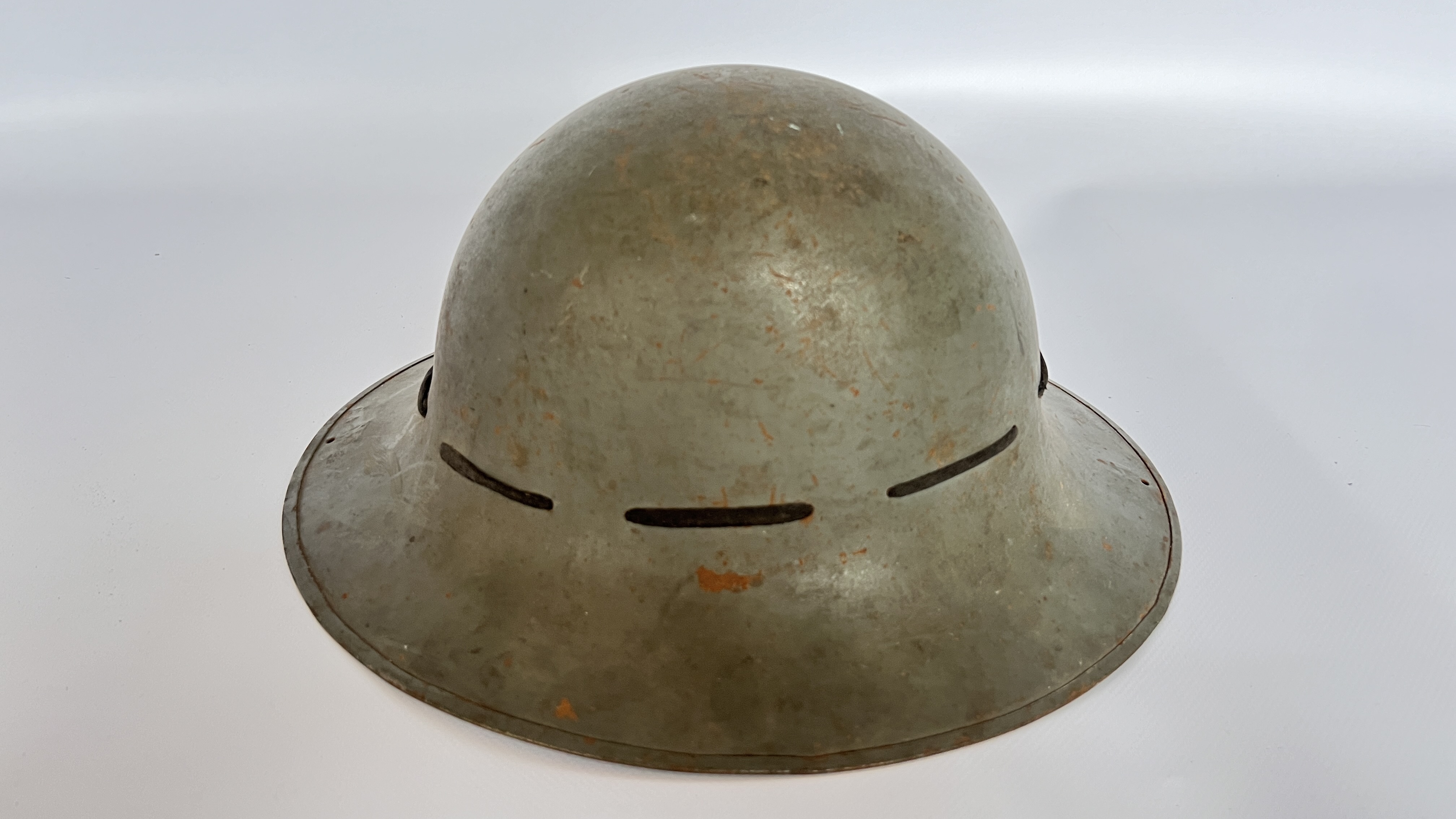 2 WWII TIN HELMETS, 1 FAP, 1 GREY - A/F CONDITION, SOLD AS SEEN. - Image 7 of 8