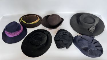 2 HAT BOXES CONTAINING 7 1940S FELT HATS, 3 BLACK, 2 BROWN, 2 NAVY - A/F CONDITION, SOLD AS SEEN.