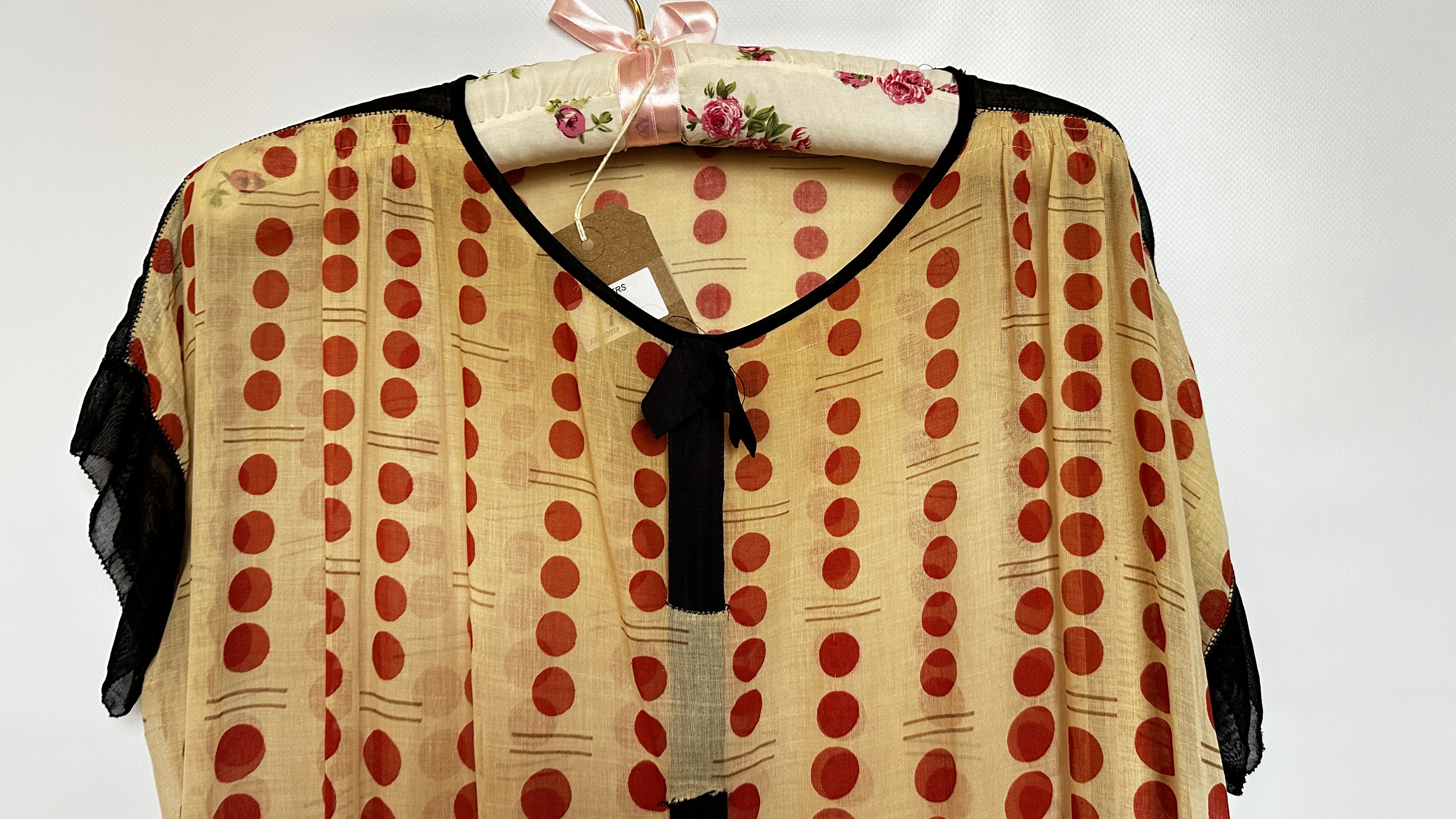 1920S MUSLIN BEIGE DROP WAISTED DRESS WITH RED SPOTS, BLACK TRIM TO SLEEVES, - Image 2 of 14