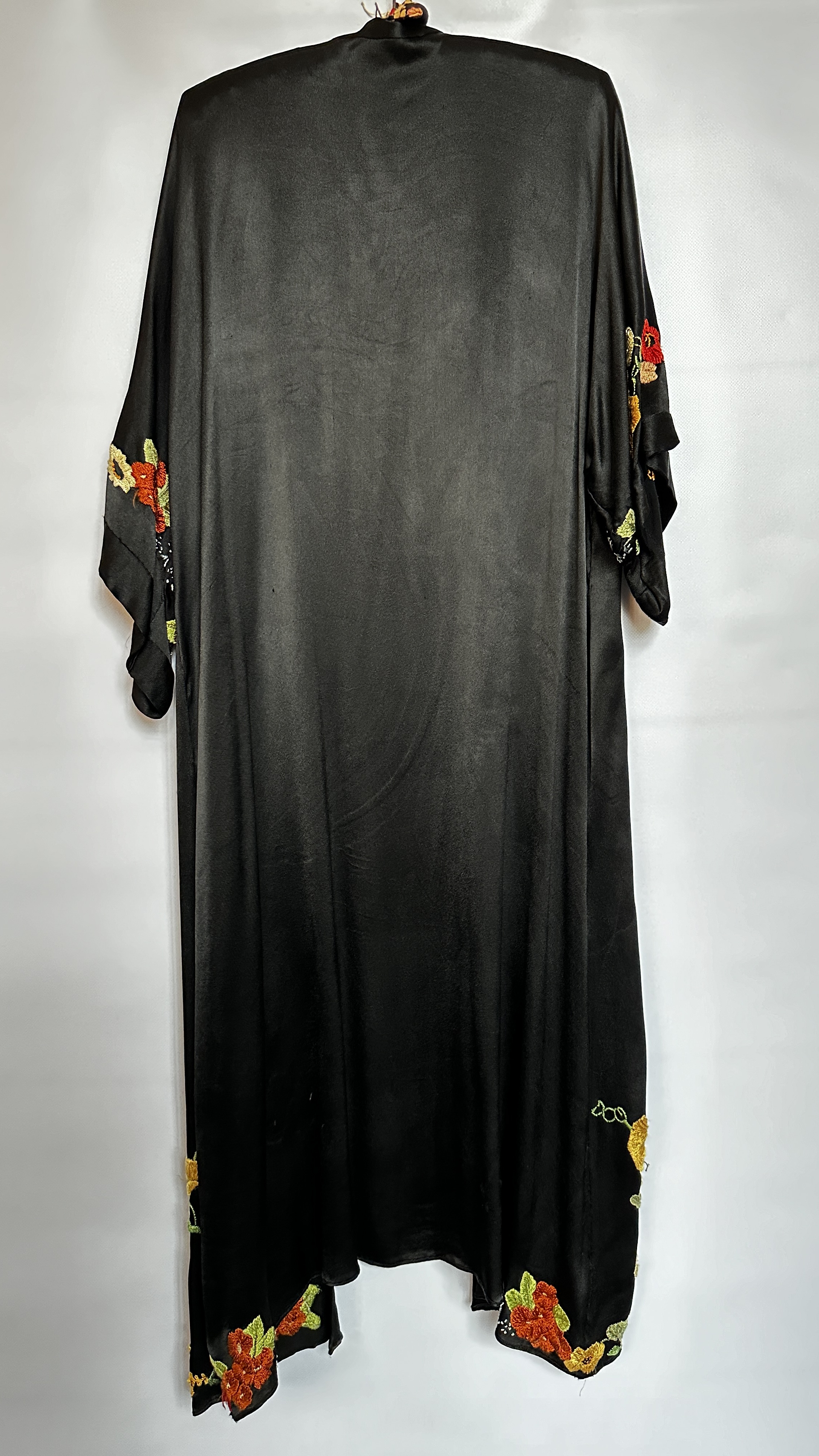 1920S BLACK SATIN ¾ LENGTH COAT WITH NASTURTIUM EMBROIDERY TO SLEEVES AND HEMLINE - A/F CONDITION, - Image 11 of 15