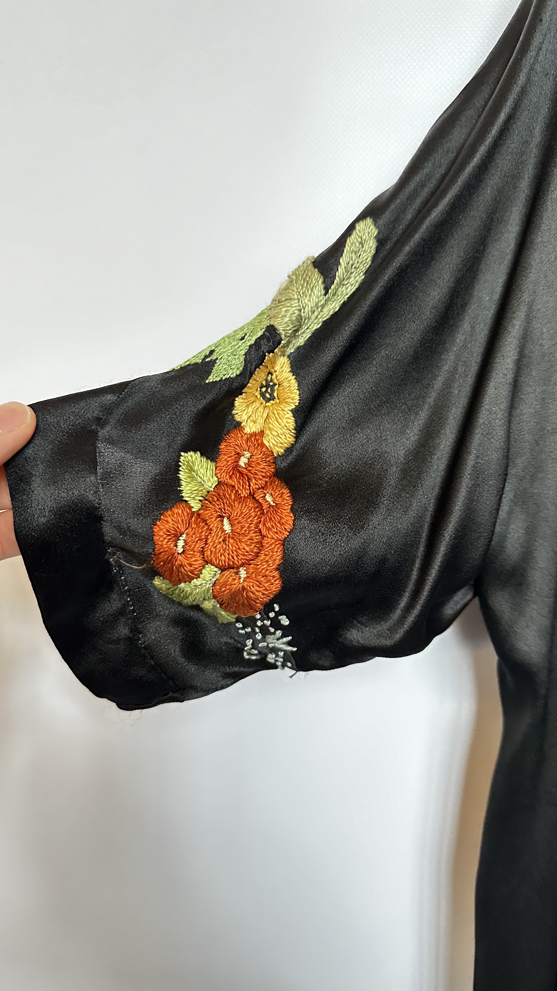 1920S BLACK SATIN ¾ LENGTH COAT WITH NASTURTIUM EMBROIDERY TO SLEEVES AND HEMLINE - A/F CONDITION, - Image 10 of 15