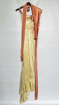 1930S CREAM FLOWERED SILK SATIN GOWN, LONG PINK SASH, FRILLED HEMLINE - A/F CONDITION, SOLD AS SEEN.