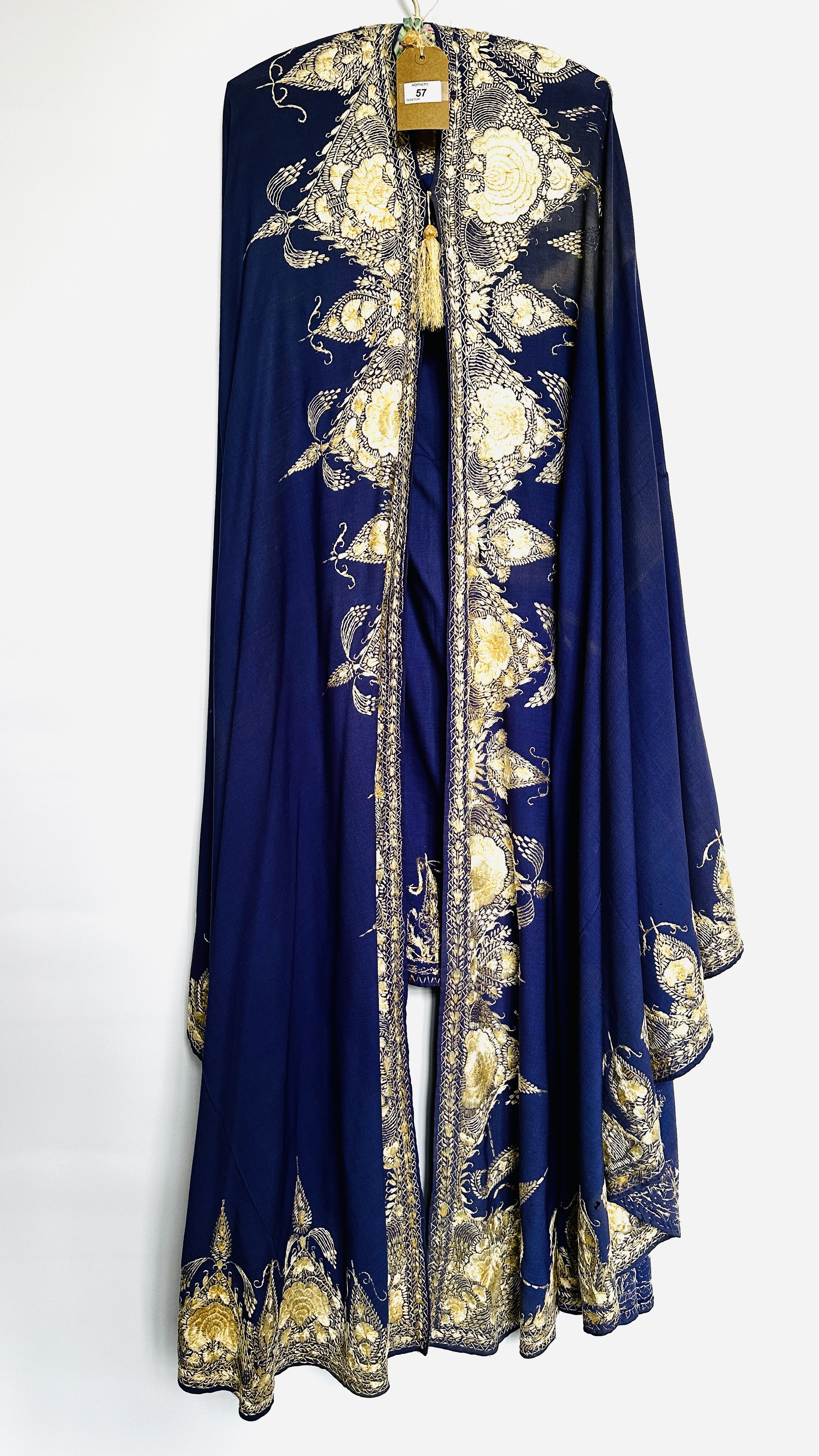 1920S PURPLE FINE WOOL CAPE HEAVILY EMBROIDERED WITH CREAM SILK, TASSEL AT NECKLINE AND HOOD,