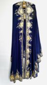 1920S PURPLE FINE WOOL CAPE HEAVILY EMBROIDERED WITH CREAM SILK, TASSEL AT NECKLINE AND HOOD,