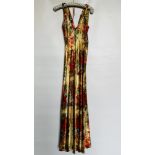 1930S CREAM & RED SATIN EVENING GOWN WITH CORAL/BLUE/GREEN FLOWERED DESIGN,