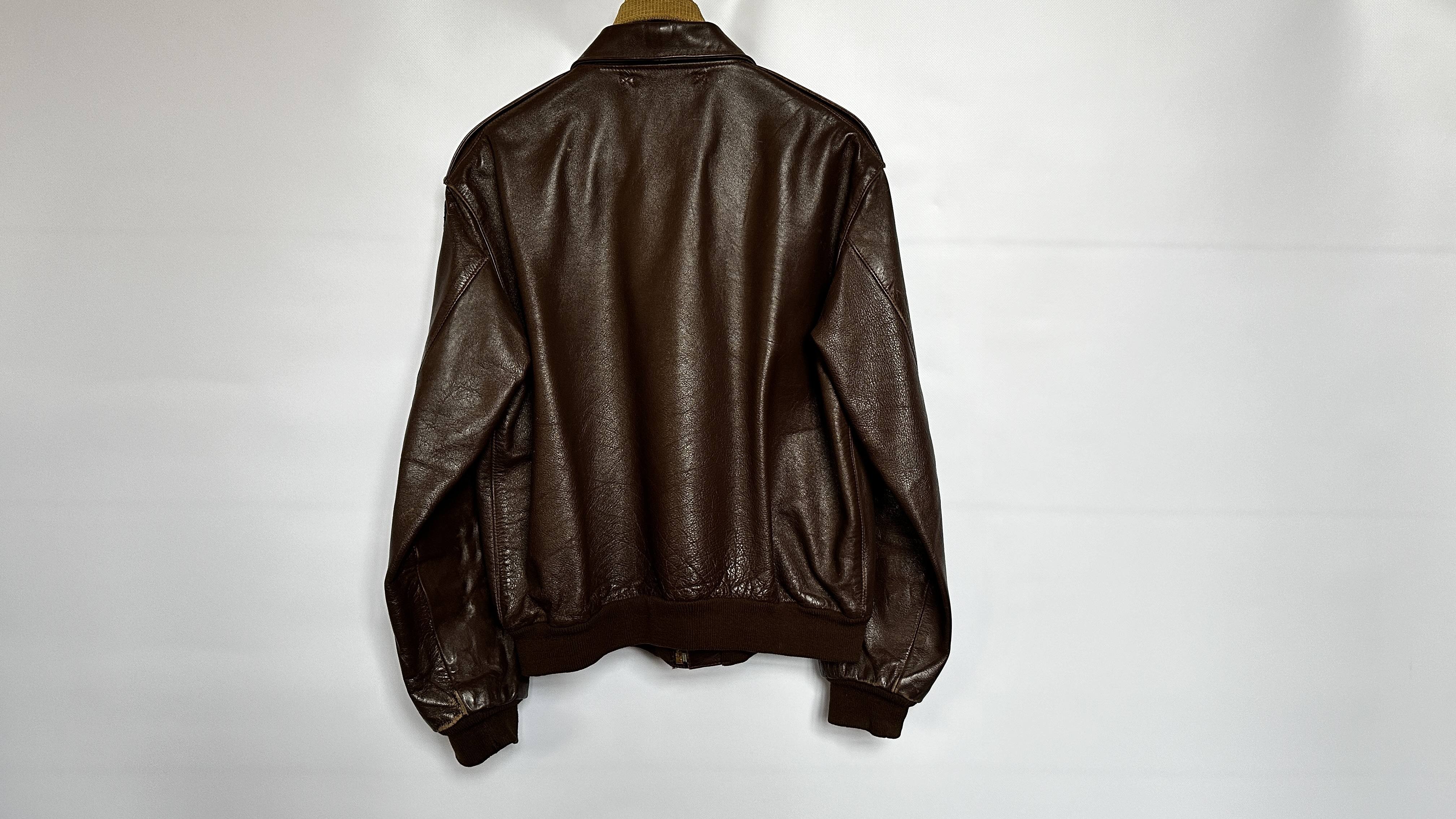 A REPRODUCTION TYPE A2 AMERICAN BROWN LEATHER BOMBER STYLE JACKET BY EASTMAN LEATHER CLOTHING - - Image 22 of 29