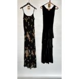 1960S BLACK FLOWERED CREPE DRESS AND A 1930S BLACK SILK VELVET DRESS WITH FRILLED SKIRT FROM