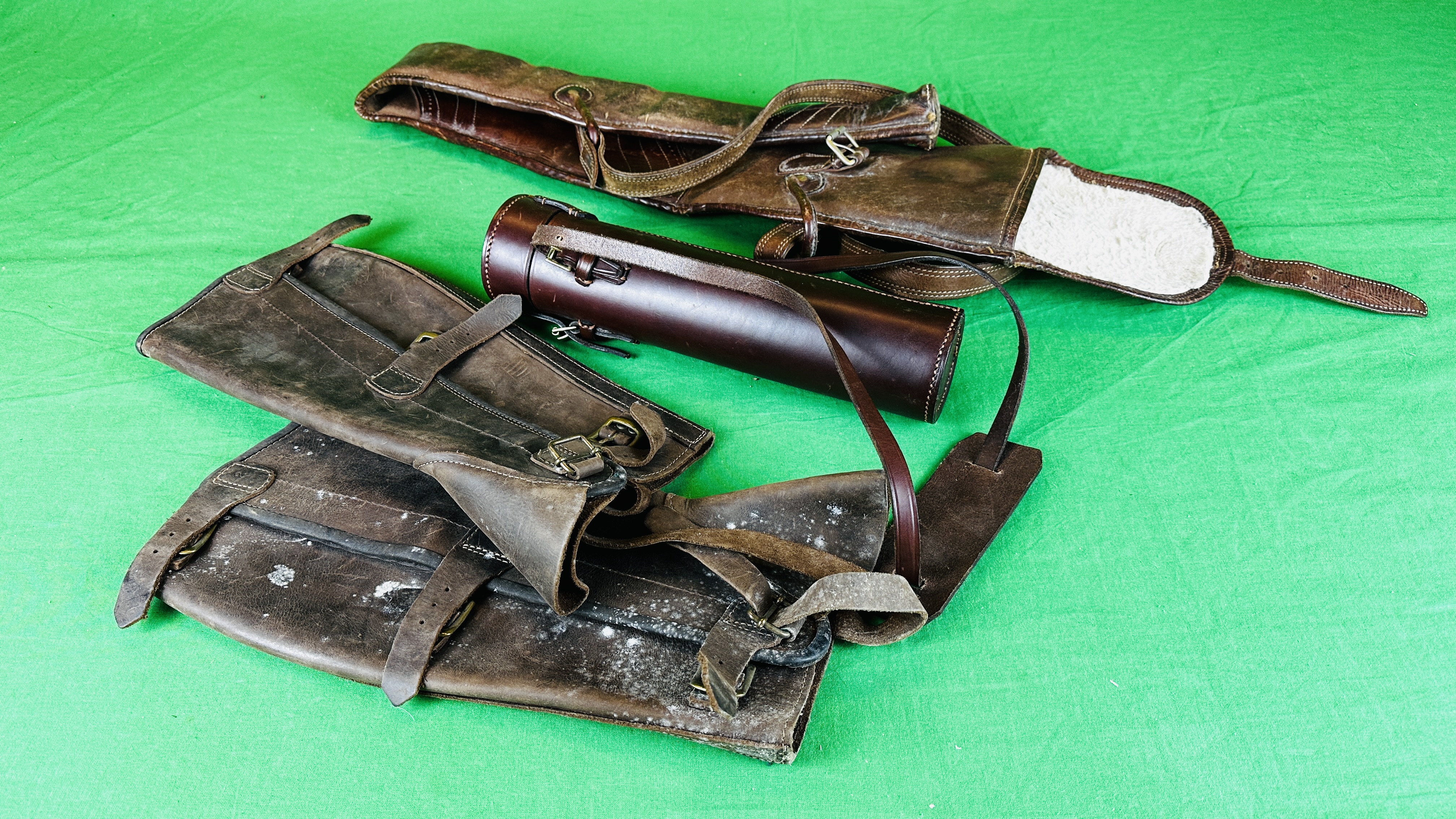 PAIR LEATHER GAITERS, LEATHER SHOTGUN SLIP AND TAN LEATHER FLASK HOLDER.