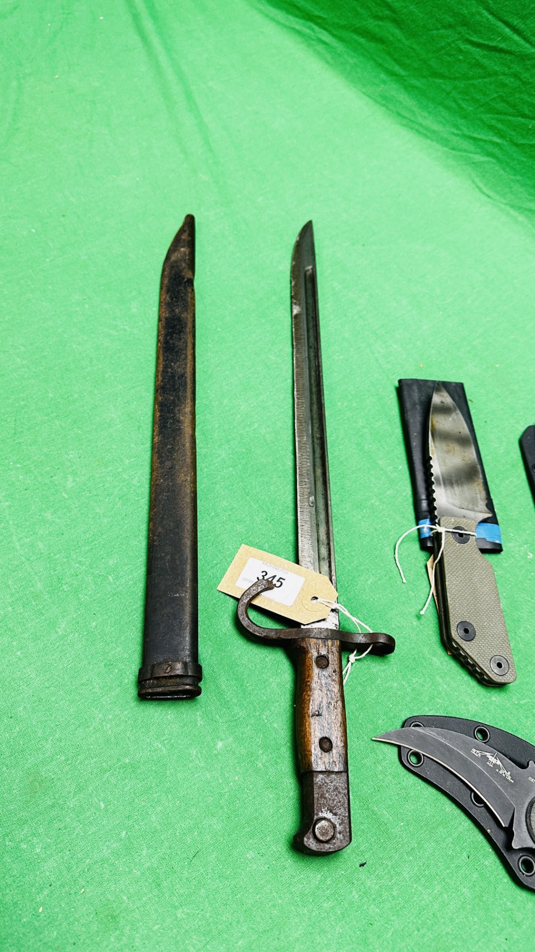 AN ANTIQUE FRENCH BAYONET WITH SCABBARD ALONG WITH THREE VARIOUS KNIVES INCLUDING EMERSON, STRIDER, - Image 7 of 7