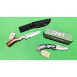 A HUNTING KNIFE IN CANVAS BELT SHEATH ALONG WITH WITH CRKT FOLDING LOCK KNIFE - NO POSTAGE OR