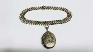 A VICTORIAN WHITE METAL LOCKET AND COLLAR.