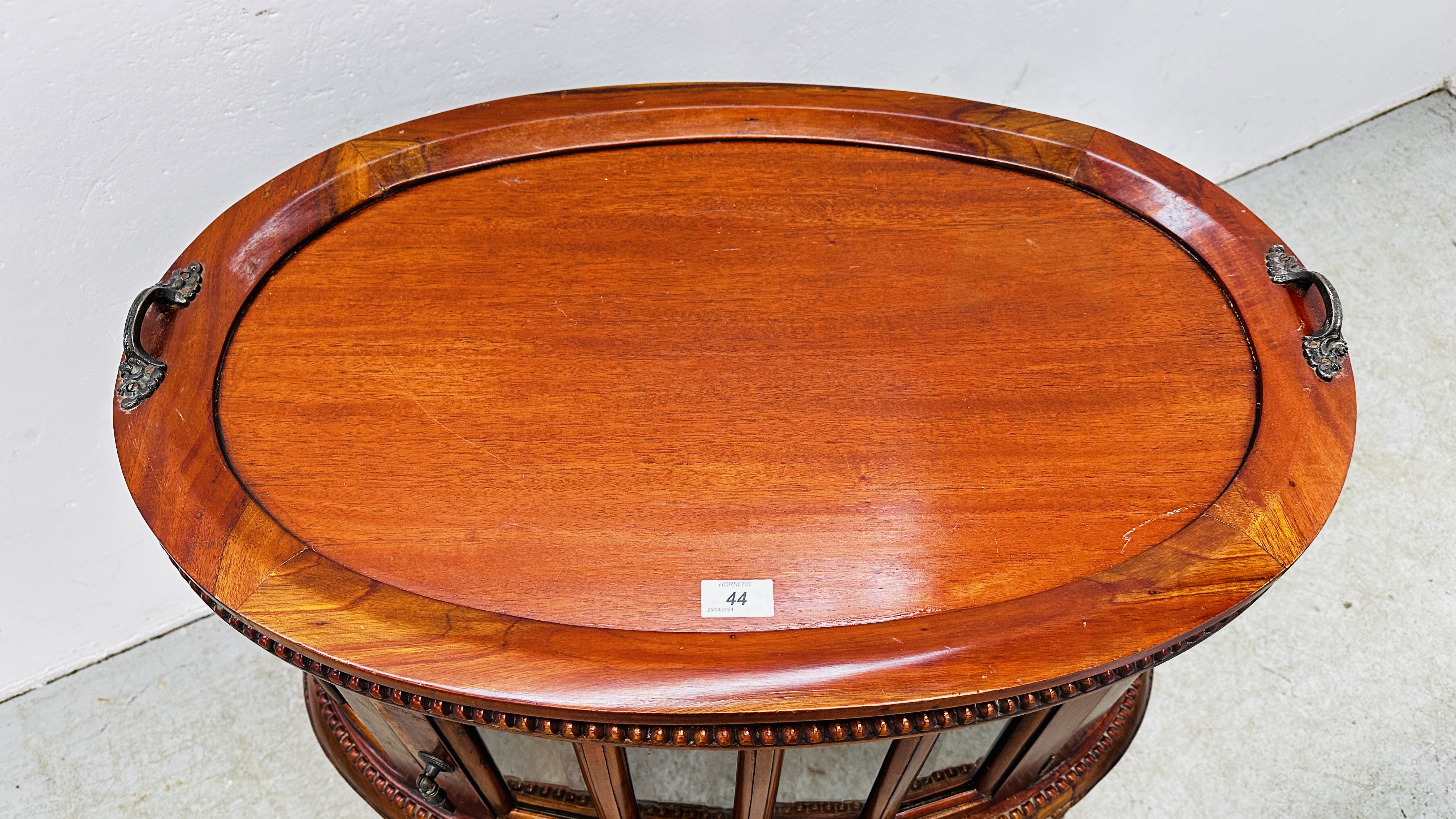A REPRODUCTION MAHOGANY OVAL DRINKS CABINET WITH TRAY TO TOP, - Image 3 of 10