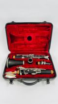 A "SONATA" CLARINET IN FITTED VELVET LINED CASE.