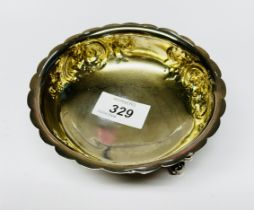 A VICTORIAN SILVER EMBOSSED DISH ON THREE RAISED SUPPORTS, LONDON ASSAY 1861, MAKER R.