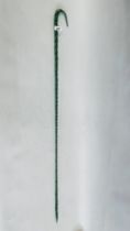 A CLEAR GLASS TWISTED WALKING CANE, LENGTH............CM.