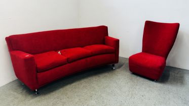 A DESIGNER MODERN RED UPHOLSTERED CURVED SOFA AND MATCHING SIDE CHAIR.