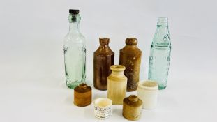A GROUP OF VINTAGE STONEWARE AND GLASS BOTTLE AND JARS TO INCLUDE EXAMPLES MARKED DUNBARS,
