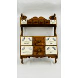 A VINTAGE WAXED PINE WALL MOUNTED MULTI DRAWER STORAGE CABINET WITH 6 CERAMIC DRAWERS H 72 X W 50,