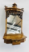 AN ELABORATE VINTAGE CARVED OAK WALL MOUNTED MIRROR WITH SINGLE CONCEALED DRAWER W 46CM X H 98CM.