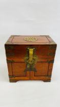 A CHINESE BRASS DECORATED JEWELLERY BOX WITH LOCK AND KEY - H 30 X W 30.5 X D 20CM.